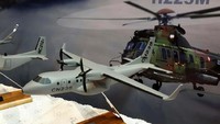 Miniatur pesawat buatan Bandung dipamerkan di booth PTDI yang terletak di Hall B1 JIExpo Kemayoran, Jakarta. Pool/Dok PTDI.