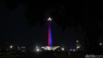 Foto: Monas Malam ini Berhiaskan Sorot Lampu Khas ASEAN