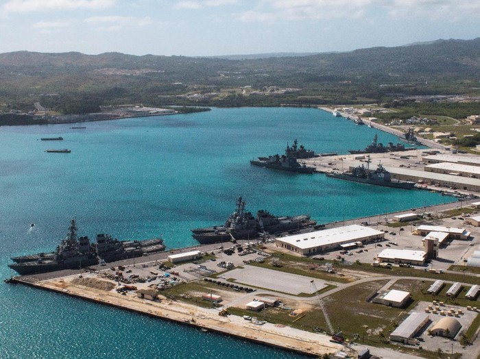 FILE PHOTO: Navy vessels are moored in port at the U.S. Naval Base Guam at Apra Harbor, Guam March 5, 2016.  Major Jeff Landis,USMC (Ret.)/Naval Base Guam/Handout/File Photo via REUTERS. ATTENTION EDITORS - THIS IMAGE WAS PROVIDED BY A THIRD PARTY