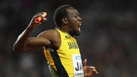 Tapi, Bolt malah menyudahi kariernya dengan catatan kurang oke. Dia meraih perunggu pada nomor 100 meter dan gagal finis di nomor lari estafet 4x100m. (Matthias Hangst/Getty Images)