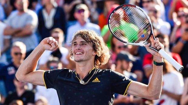 Zverev merayakan kemenangannya atas Federer.