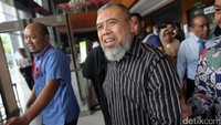 Patrialis meninggalkan Pengadilan Tipikor.