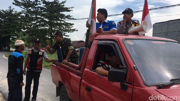  TNI-Polri Ajak Warga Pekanbaru Kibarkan Sang Merah Putih