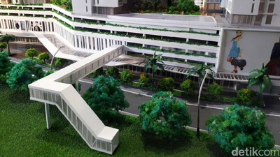 Foto: Keren! Ada Rusunami di Atas Stasiun