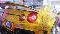 KUHL Racing R35 GT-R berlapis emas ini merupakan salah satu mobil dengan level modifikasi terumit. Karena sekujur bodi mobil dilakukan dengan teknik pemahatan 3D masking terbaik di dunia oleh Rohan Izawa. Foto: Ruly Kurniawan
