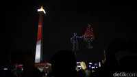 Seremoni hitung mundur 365 hari di Jakarta dihelat di Silang Monas, Jumat (18/8/2017). Perhelatan tersebut dibuka dengan atraksi drone warna-warni di langit Monas.