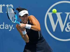 Muguruza ke Perempatfinal Usai Tanding Tiga Set, Halep Juga Lolos