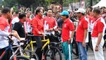 Foto: Senyum Jokowi Saat Gowes ke Thamrin