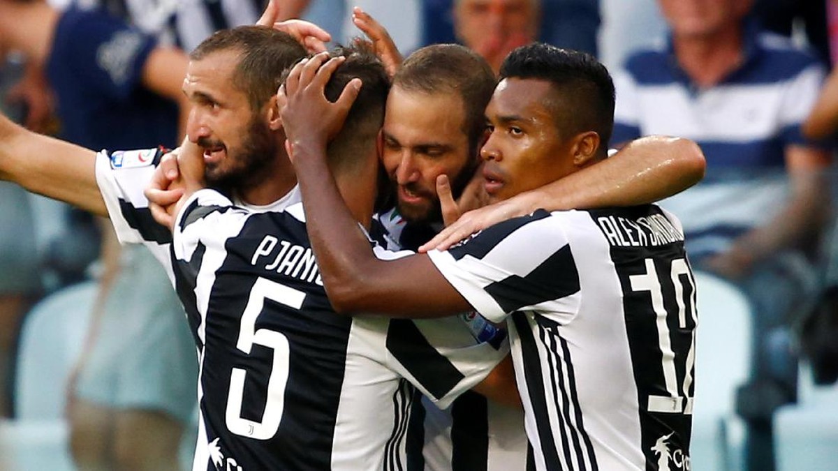 Juventus mengawali musim dengan mengalahkan Cagliari 3-0 (Stefano Rellandini/Reuters)