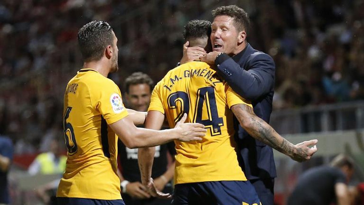 Atletico Madrid bermain imbang 2-2 dengan klub promosi Girona (Pau Barrena/AFP)