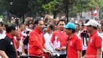 Foto: Senyum Jokowi Saat Gowes ke Thamrin