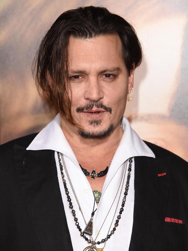 Johnny Depp attends the premiere of Focus Features The Danish Girl at Westwood Village Theatre on November 21, 2015 in Westwood, California.  (Photo by Jason Merritt/Getty Images)