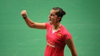 Carolina Marin dari Spanyol menjadi juara dunia untuk kali kedua pada 2015. Dia mengalahkan Saina Nehwal (India) 21-16, 21-19 di final. (Robertus Pudyanto/getty Images)