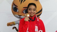 Emas kedelapan Indonesia diraih pewushu Juwita Niza Wasni dari nomor kombinasi nandao dan nangun.  (istimewa)