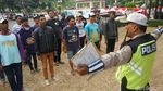 Begini Wajah-wajah Sukarelawan Pengatur Lalu Lintas