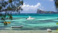 Selanjutnya adalah Mauritius. Negara kepulauan di Samudra Hindia ini memiliki pantai yang sering dipotret sebagai wallpaper desktop pc. Sepanjang pantai timurnya adalah tempat yang sempurna untuk snorkeling, barbecue, dan menari berpesta bersama kawan (Foto: Sofitel So Mauritius/CNN Travel)