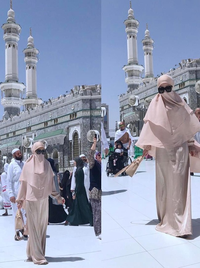 Foto OOTD tentunya tidak mau dilewatkan oleh Syahrini. Kali ini, ia berbalut gamis berwarna coklat pastel, lengkap dengan hijab dan cadar berwarna senada. (Foto: Instagram)