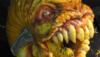 Monster ikan dengan taring tajam dan maya merah ini ternyata dibuat dari sebuah labu. Foto: Istimewa