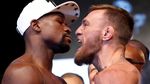 Foto: Sesi Timbang Badan McGregor-Mayweather Berlangsung Panas
