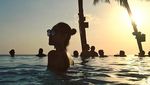 Lekuk Tubuh Bunga Citra Lestari dalam Siluet Sunset