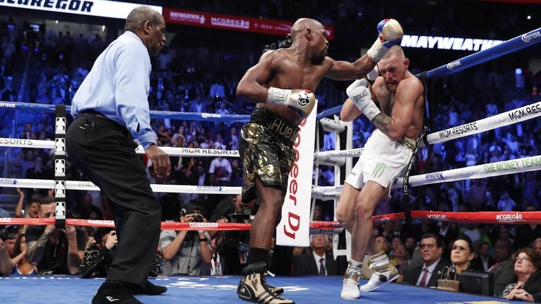 Mayweather Menang TKO atas McGregor Mayweather Menang TKO atas McGregor