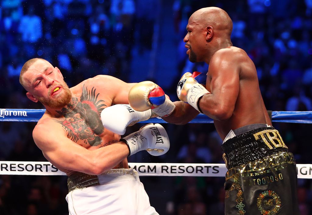 Boxing - Floyd Mayweather Jr. vs Conor McGregor - Las Vegas, USA - August 26, 2017 Floyd Mayweather Jr. in action with Conor McGregor REUTERS/Steve Marcus