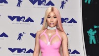 Ia lebih menyukai high heels setinggi 7 inchi untuk mendukung penampilannya itu. Dok. Getty Images