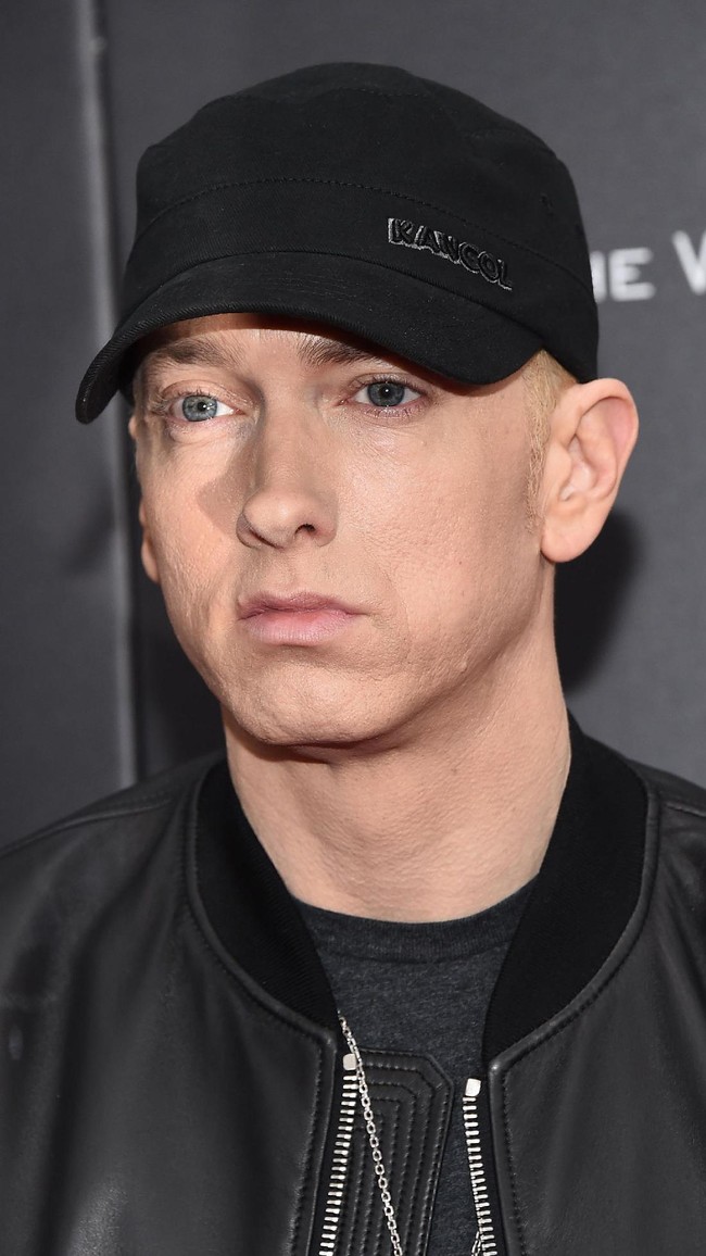 Seperti Kanye West, rapper satu ini juga jarang tersenyum. Entah ingin terlihat cool atau memang memiliki wajah yang jutek. Foto: dok. Getty Images