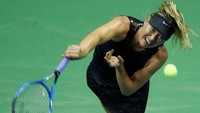 Dia menghabisi petenis Rumania itu dengan skor 6-4, 4-6, dan 6-3 dalam waktu 2 jam dan 42 menit. REUTERS/Shannon Stapleton.