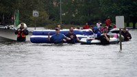 Usai badai menerjang, banjir besar melumpuhkan Houston, kota terbesar di Texas. Foto: REUTERS/Rick Wilking