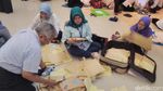 Foto: Saat Jemaah First Travel Mencari Paspor