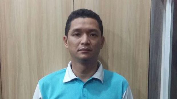 Tersangka SN (37) yang ditangkap polisi atas dugaan penipuan dan penggelapan mesin electronic data capture (EDC).