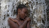 Masyarakat Haiti masih percaya dengan hal-hal mistis serta kepercayaan spiritis-animatis. Artinya percaya pula pada roh-roh leluhur dan penguasa alam semesta (Reuters)