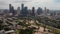 Langit Houston dengan ‘latar belakang’ banjir (Dok. REUTERS/Adrees Latif)