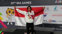 Gagarin Nathaniel Yus menambah koleksi emas dari cabang olahraga renang, emas ketiga, sekaligus menjadi emas ke-20 untuk Indonesia. Gagarin menjadi yang tercepat di nomor 100m putra gaya dada.(dok. PB PRSI)0
