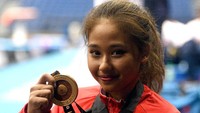 Rifda Irfanaluthfi membuat kejutan dengan meraih emas justru bukan di nomor andalannya. Rifda mendapatkan emas di nomor senam artistik balok keseimbangan putri. (Sigid Kurniawan/Antara Foto)