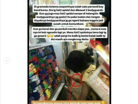 Pria diduga G-Dragon sedang memilih spidol di Gramedia.