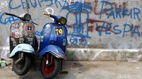 Coretan dinding yang menandai blok ini dibawah kuasa vespa tua.