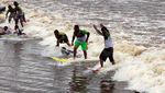 Foto: 11 Tempat Surfing Tak Biasa di Bumi