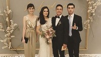 Renata Kusmanto dan Fachry Albar saat menghadiri resepsi Raisa dan Hamish Daud. (Dok. Instagram/renata711)