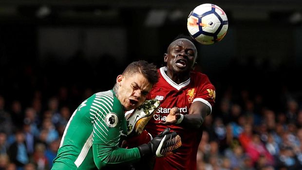 Soccer Football - Premier League - Manchester City vs Liverpool - Manchester, Britain - September 9, 2017   Manchester City's Ederson Moraes is fouled by Liverpool's Sadio Mane resulting in a red card for Mane   Action Images via Reuters/Lee Smith  EDITORIAL USE ONLY. No use with unauthorized audio, video, data, fixture lists, club/league logos or 