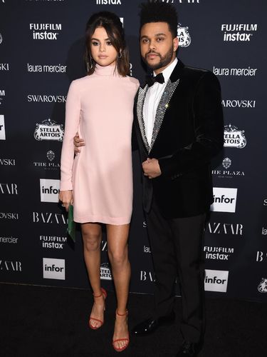 NEW YORK, NY - SEPTEMBER 08:  Selena Gomez (L) and The Weeknd attend Harper's BAZAAR Celebration of 