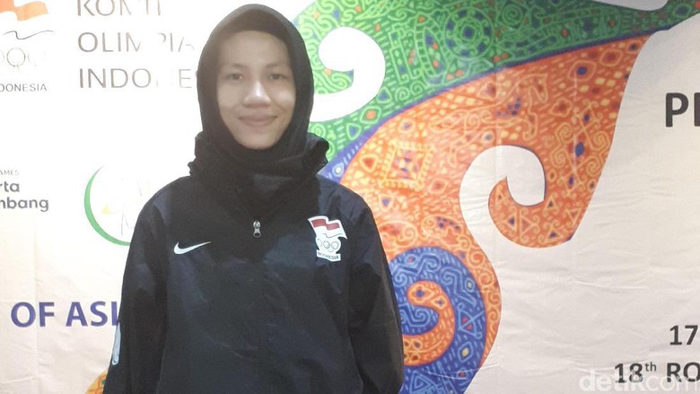 Sukses Pertahankan Emas, Mariska Mantap Berhijab Sukses Pertahankan Emas, Mariska Mantap Berhijab