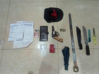 polisi menyita barang bukti 1 pucuk senpi rakitan, 8 butir peluru, 3 buah senjata tajam, dan 1 unit mobil Toyota Camry