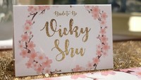 Tag nama Vicky Shu saat bridal shower digelar. Foto: Instagram caterinovista_drg