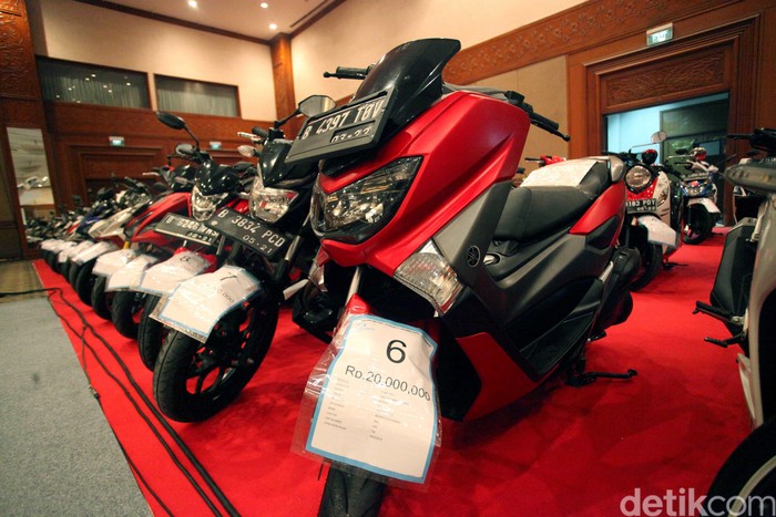 Mobil dan motor sitaan KPK telah terparkir rapi di Jakarta Convention Center (JCC). Berikut suasana lokasinya jelang pelelangan besok, Jumat (22/9).