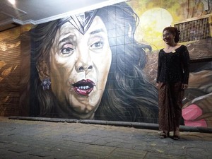Respon Menteri Susi Saat Melihat Mural Wajahnya di Tembok Solo