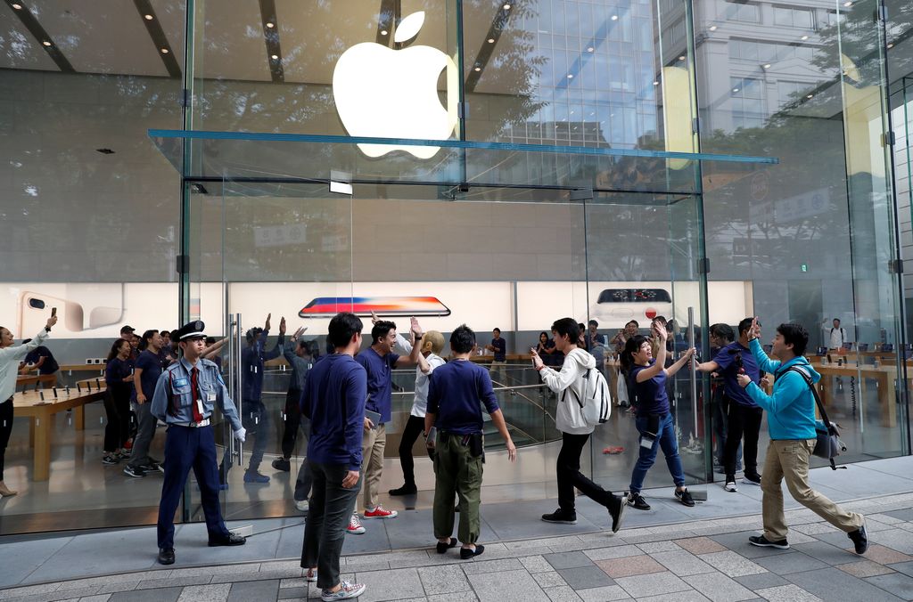 Apple fan Shoko Kimura waits for the release of Apple's new Apple Watch in front of the Apple Store at Omotesando shopping district in Tokyo, Japan, September 21, 2017.   REUTERS/Toru Hanai