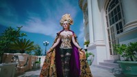 Batik karya Anne Avantie itu membalut tubuh seksi Agnes Mo. Dok. Youtube