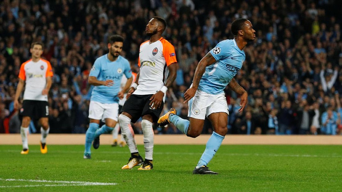 Raheem Sterling merayakan gol kedua Man City ke gawang Shakhtar Donetsk (Phil Noble/Reuters)